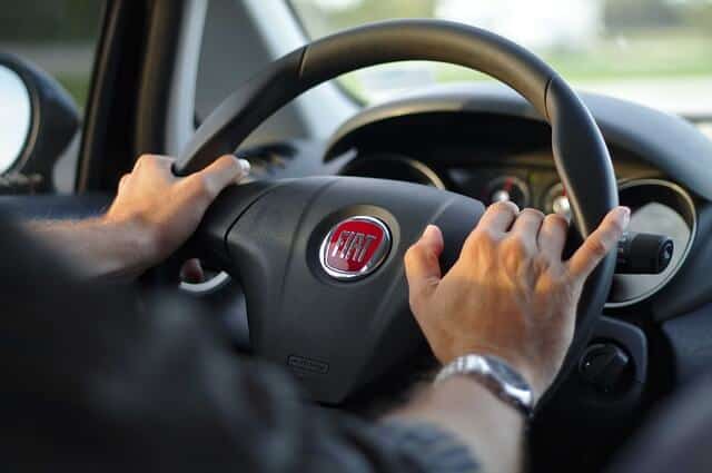 Image of hands on steering wheel